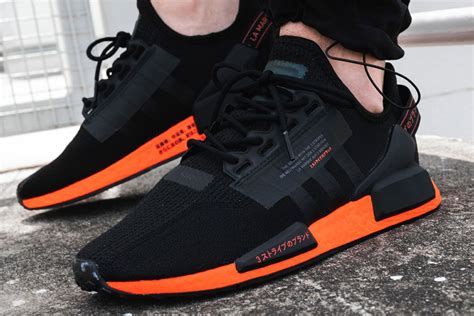 orange adidas nmd